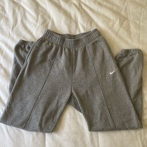 Grey Nike sweatpants, small